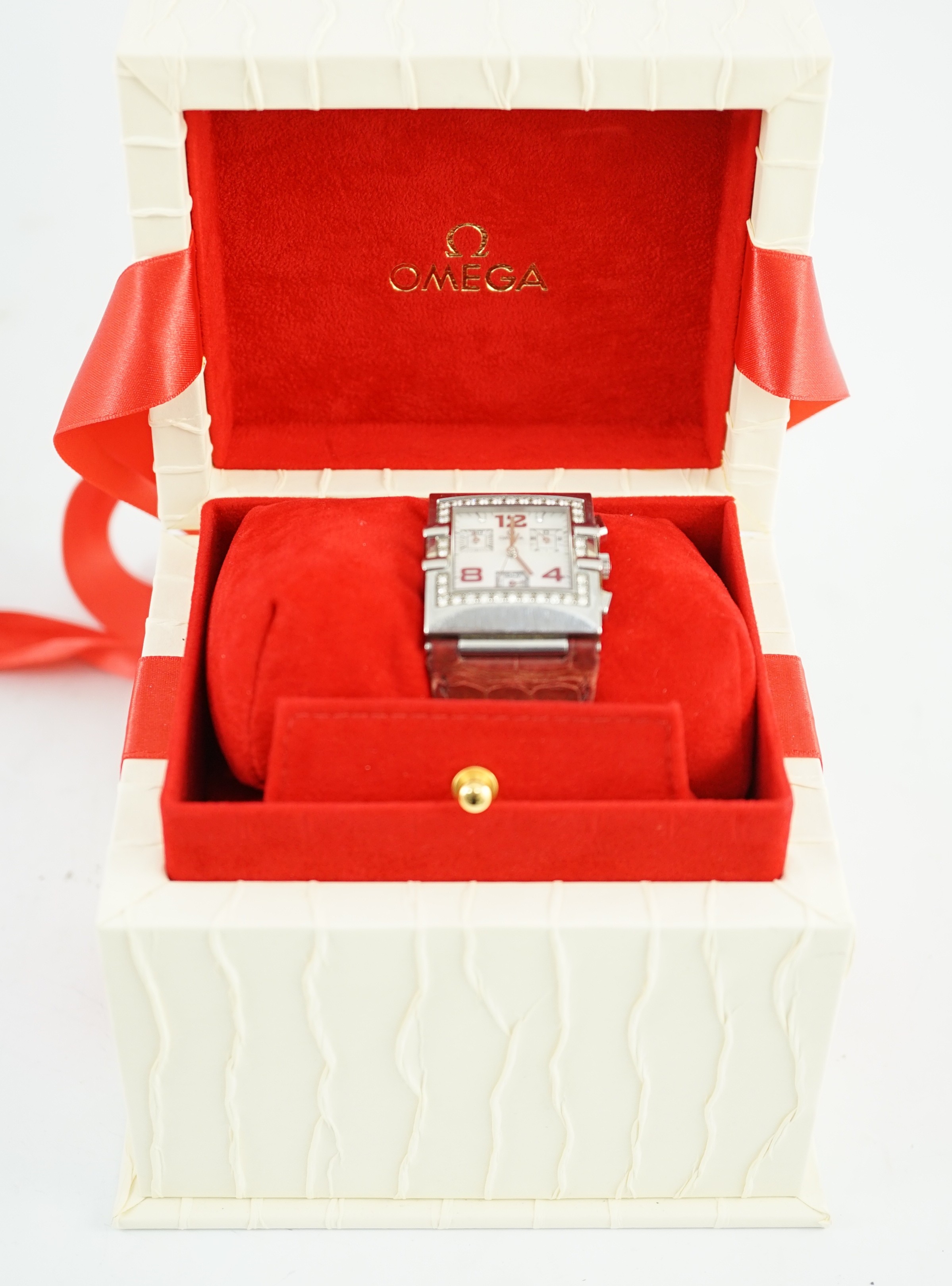 A lady's modern 2005 stainless steel Omega chronograph quartz rectangular wrist watch, with mother of pearl and diamond set dial and diamond set bezel
